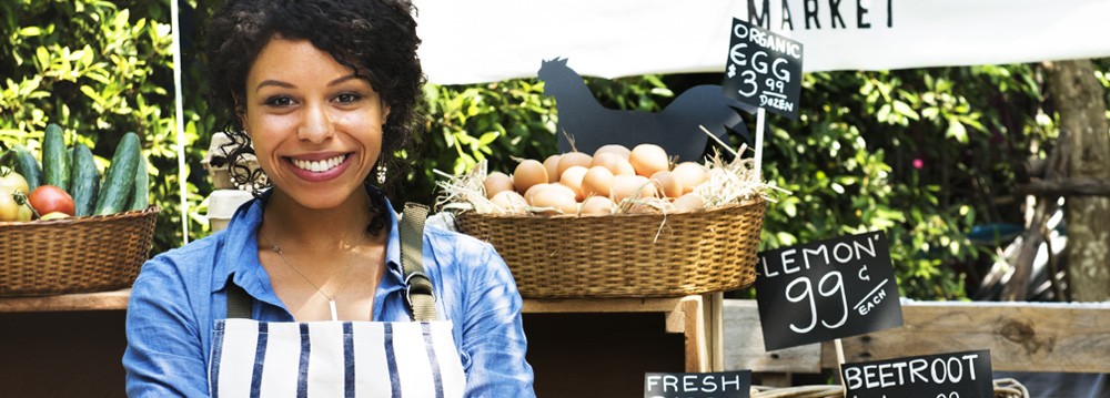 local business owner at farmer's market